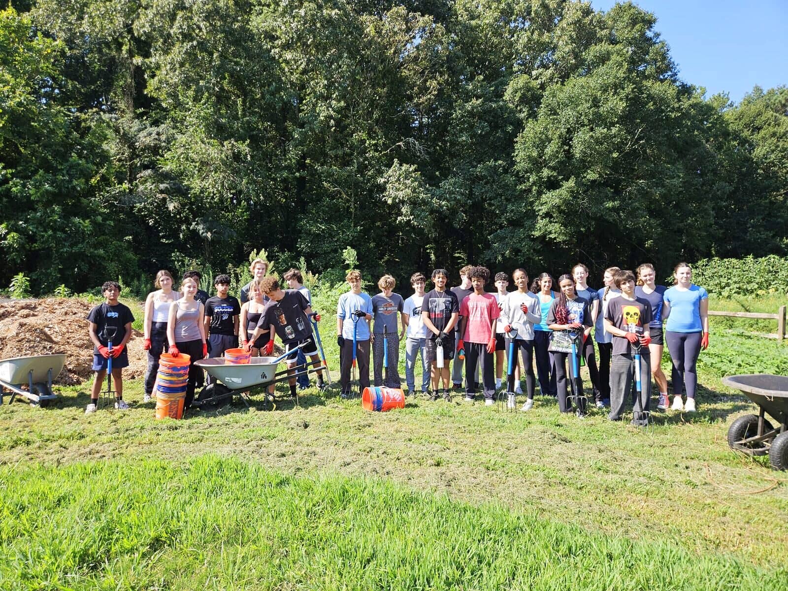 A volunteer group at the farm
