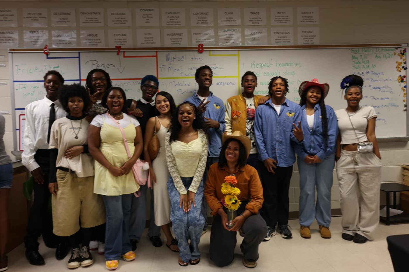 Summer program graduates standing together in a classroom at Price Middle